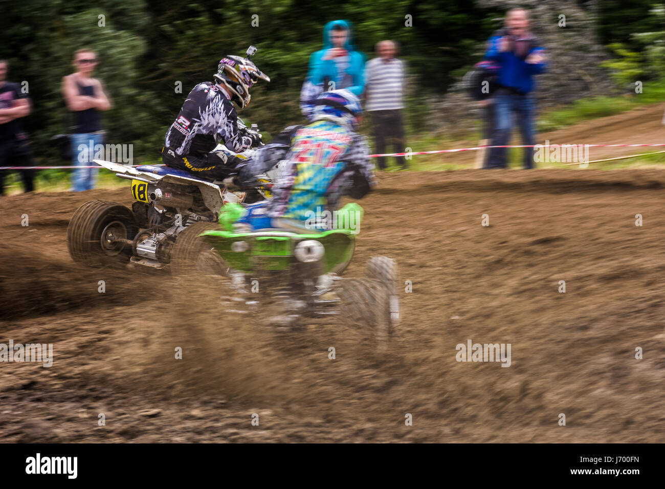 Uzhgorod, Ukraine - May 21, 2017: ATV Rider in the action. Off-road extreme cornering in dust. TransCarpathian regional Motocross Championship Stock Photo