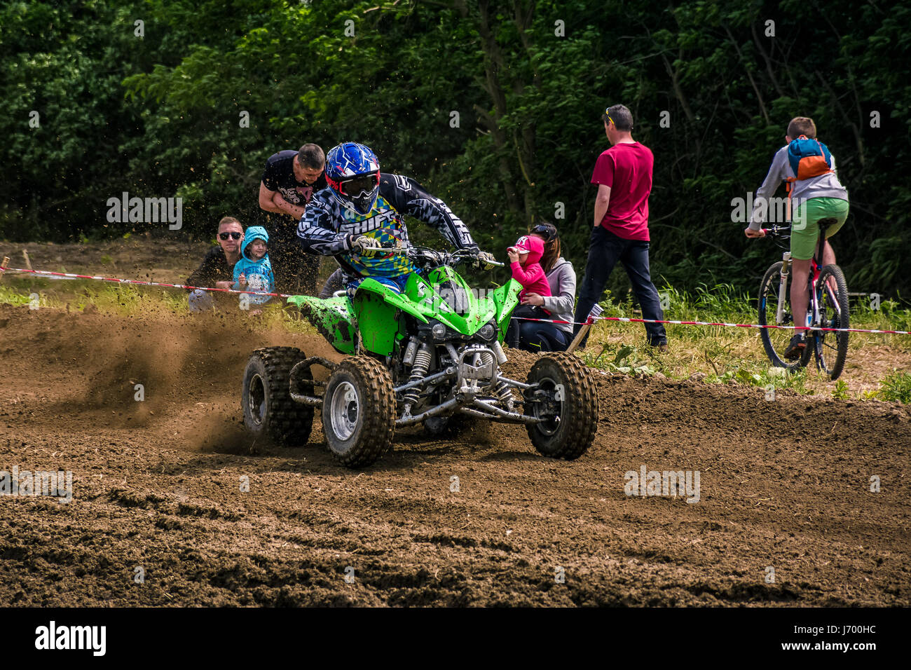 Uzhgorod, Ukraine - May 21, 2017: ATV Rider accelerating in dirt track. TransCarpathian regional Motocross Championship Stock Photo