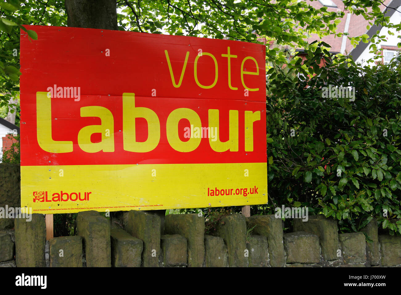 A campaign poster for the Labour party displayed in the Oldham East and Saddleworth constituency. Stock Photo