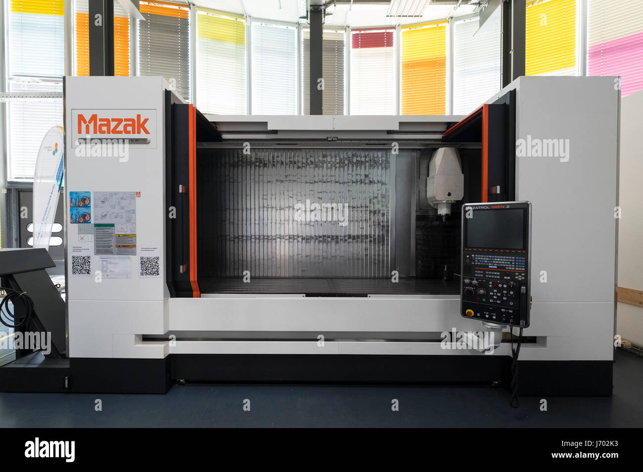 Large modern computer operated milling machine by Mazak on display at Adlershof Science and Technology Park in Berlin, Germany Stock Photo