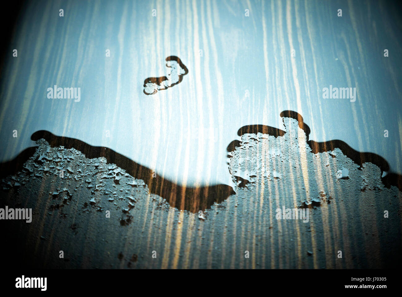 Surface tension of water on table after rain storm Stock Photo Alamy