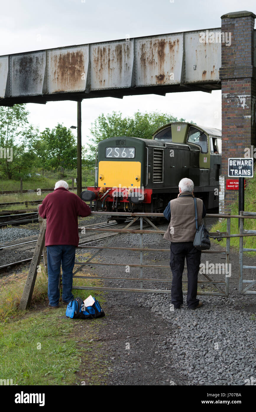 Rail enthusiasts photographing a class 17 diesel locomotive No D8568 at the Severn Valley Railway, Kidderminster, UK Stock Photo
