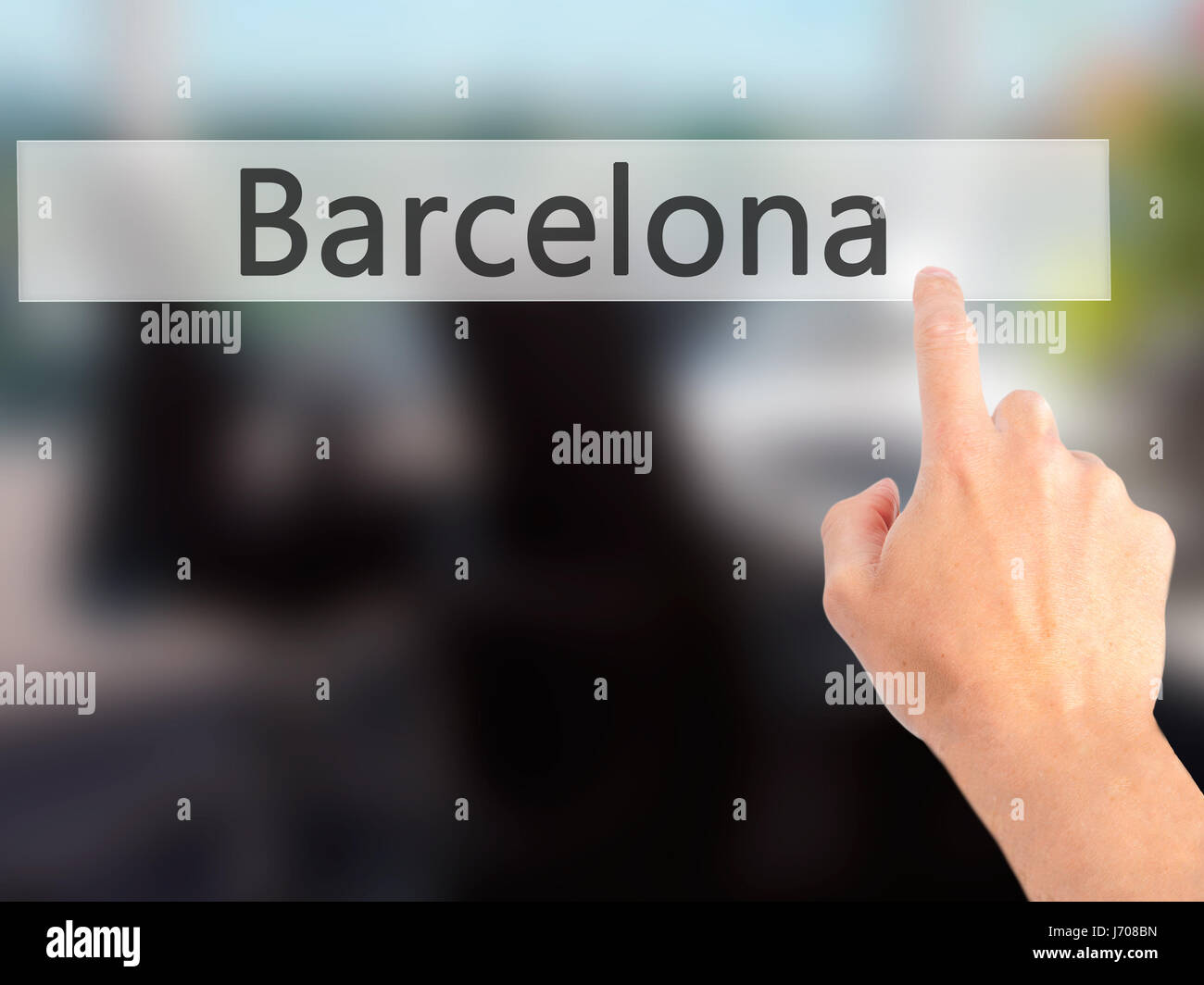 Barcelona - Hand pressing a button on blurred background concept . Business, technology, internet concept. Stock Photo Stock Photo