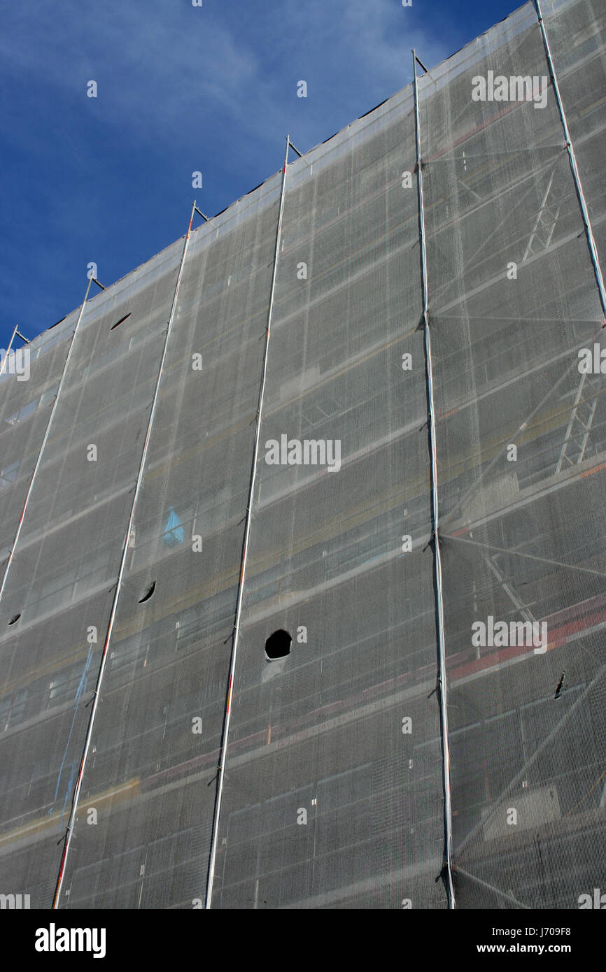 scaffold scaffolding renovation building industry modernization facade Stock Photo
