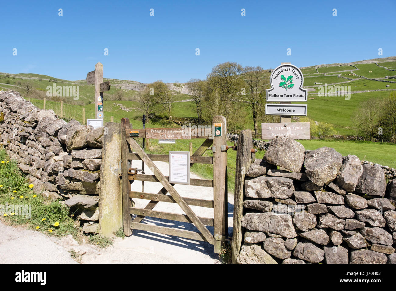 Gate and footpath access to Peregrine viewpoint at Malham Cove following Pennine Way. Malham Yorkshire Dales National Park Yorkshire England UK Stock Photo