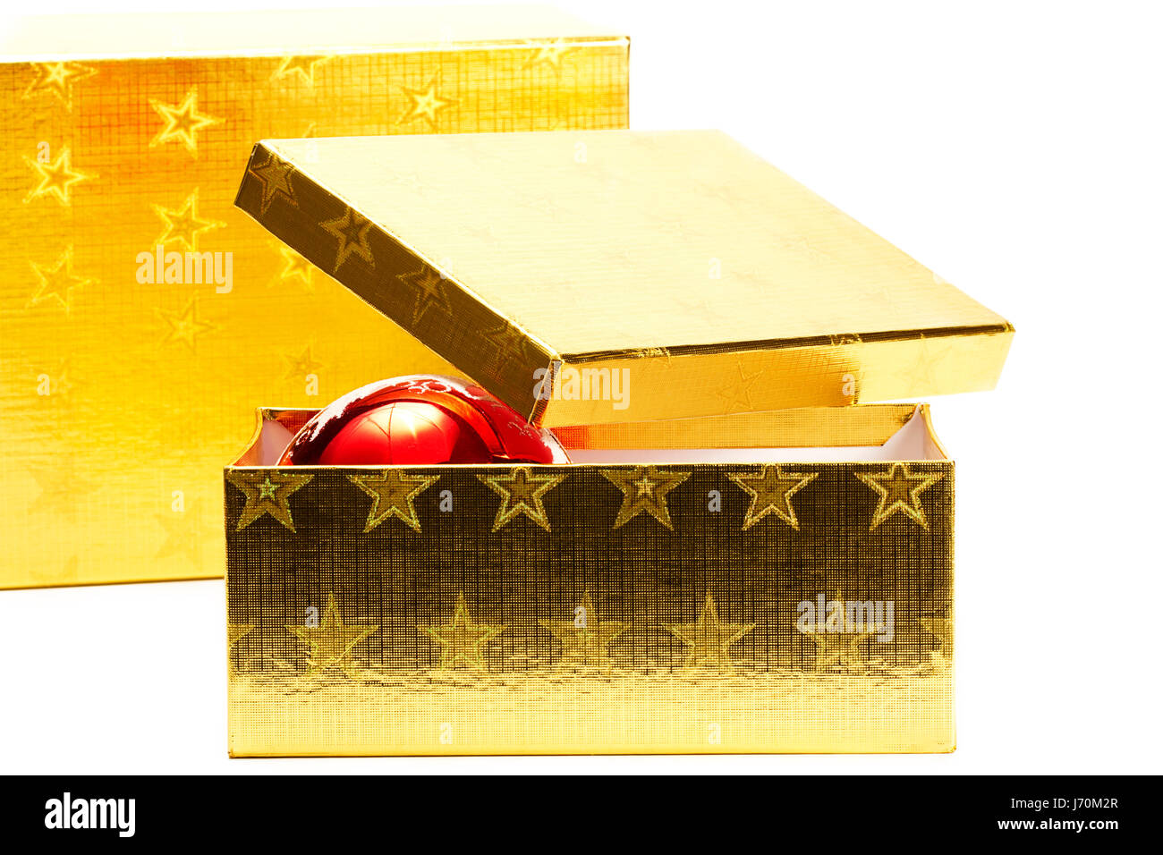 two golden gift boxes with ball Stock Photo
