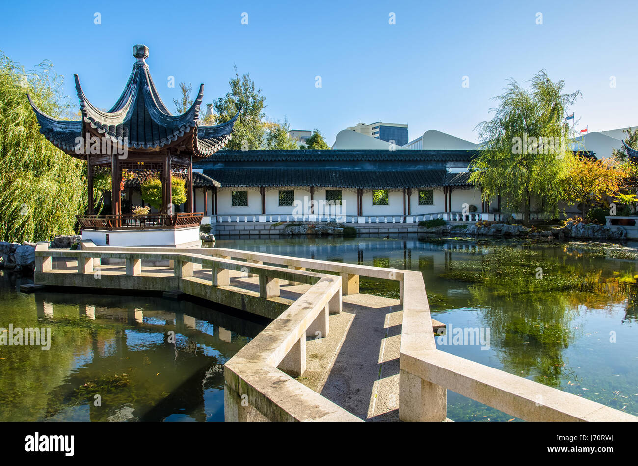 Dunedin,New Zealand - May 3,2016 : Zigzag bridge is one of the important  elements of The Dunedin Chinese Garden design Stock Photo - Alamy, image size:1300x951
