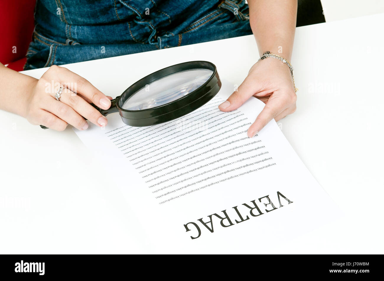contract magnifier test checking testing sample agreement purchase contract Stock Photo