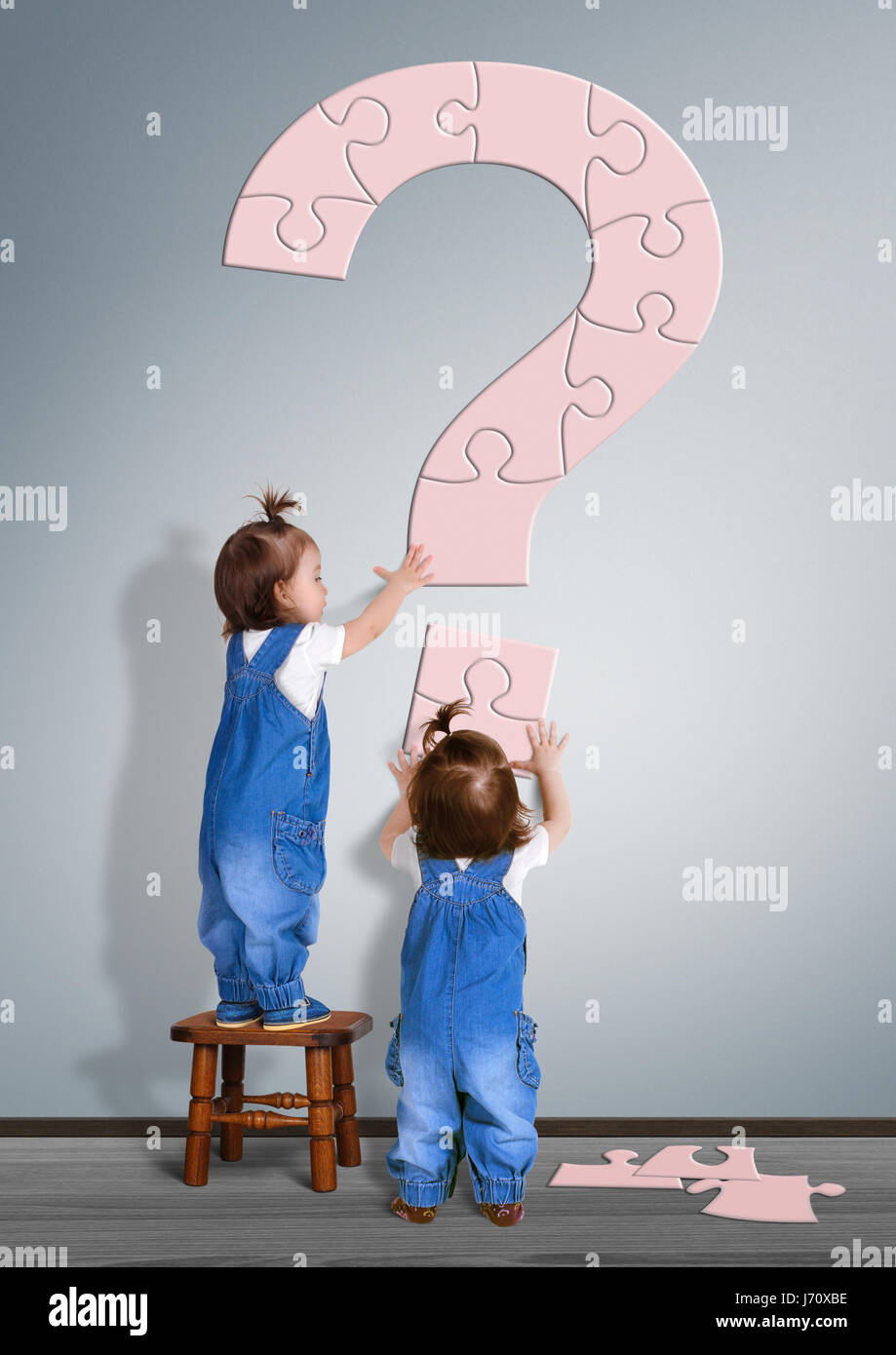 Kids question concept. Little childrens made question mark Stock Photo