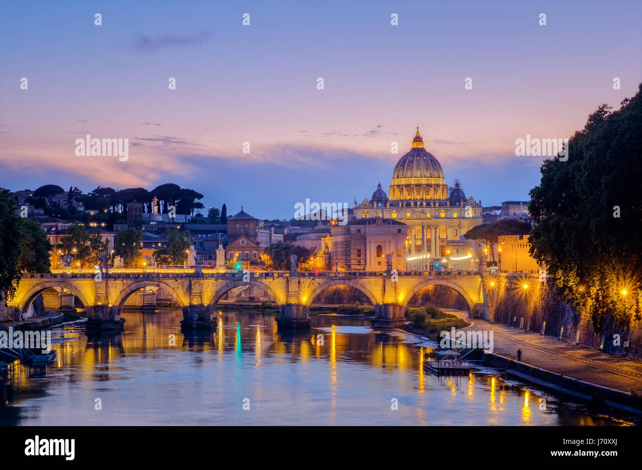 Famous citiscape view of St Peters basilica in Rome at sunset, Italy ...