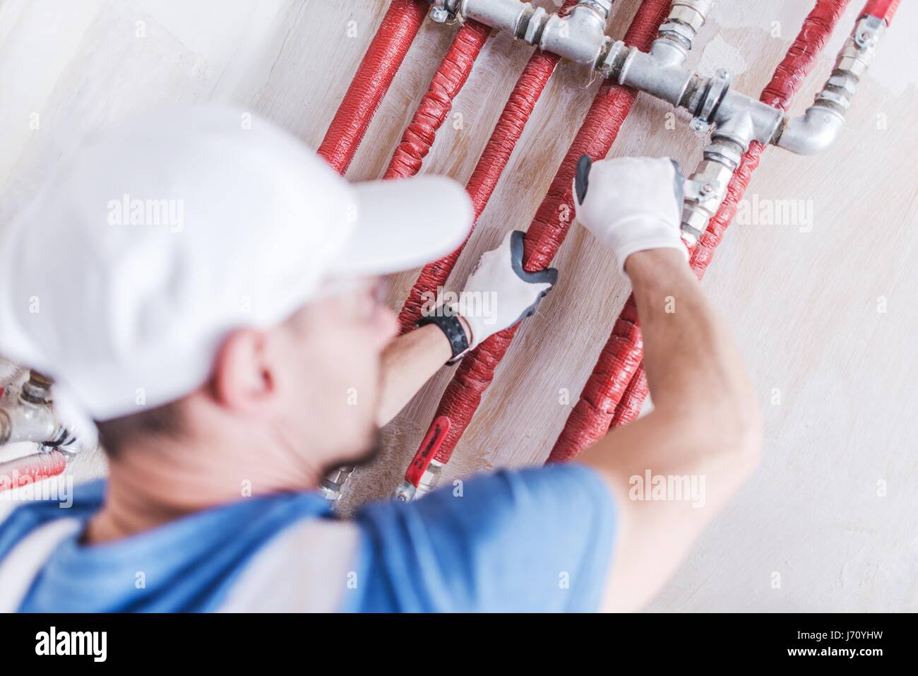 Hydraulic Worker Job. Caucasian Hydraulic Water Supply Technician