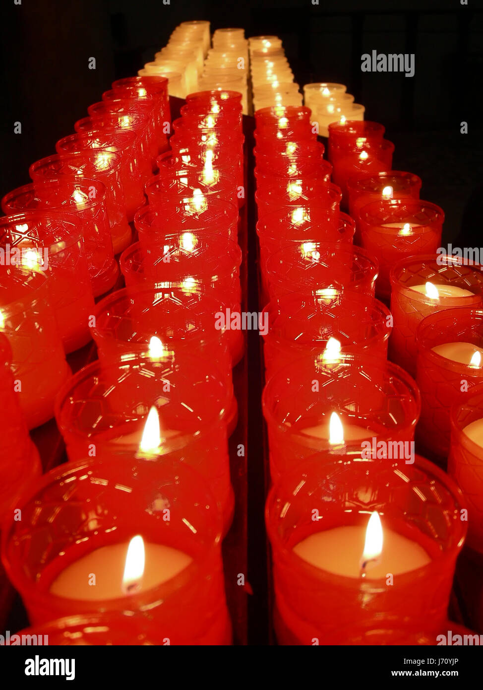 flame flames candles lit flickering devotion service red light religion flame Stock Photo Alamy