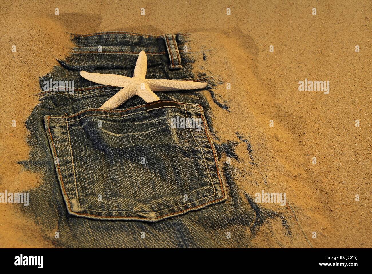 jeans on the beach Stock Photo Alamy
