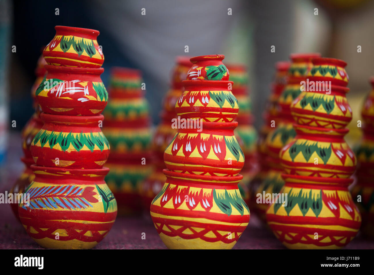 Colourful clay pots locally called Shokher Hari display at ‘Karu Mela
