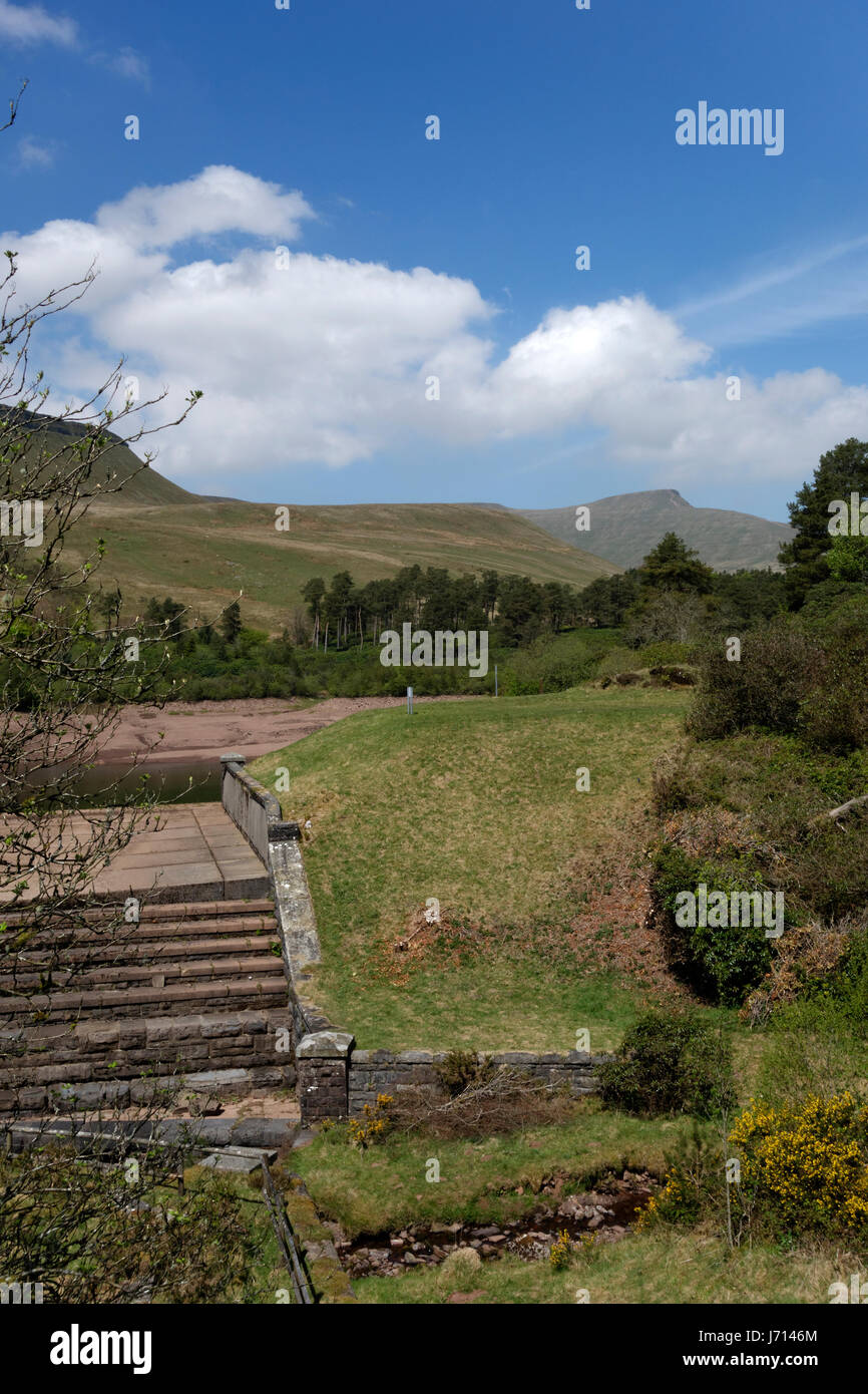 Empty Lower Neuadd Reservoir and the Brecon Beacons, Brecon Beacons National Park, Powys, Wales. Stock Photo