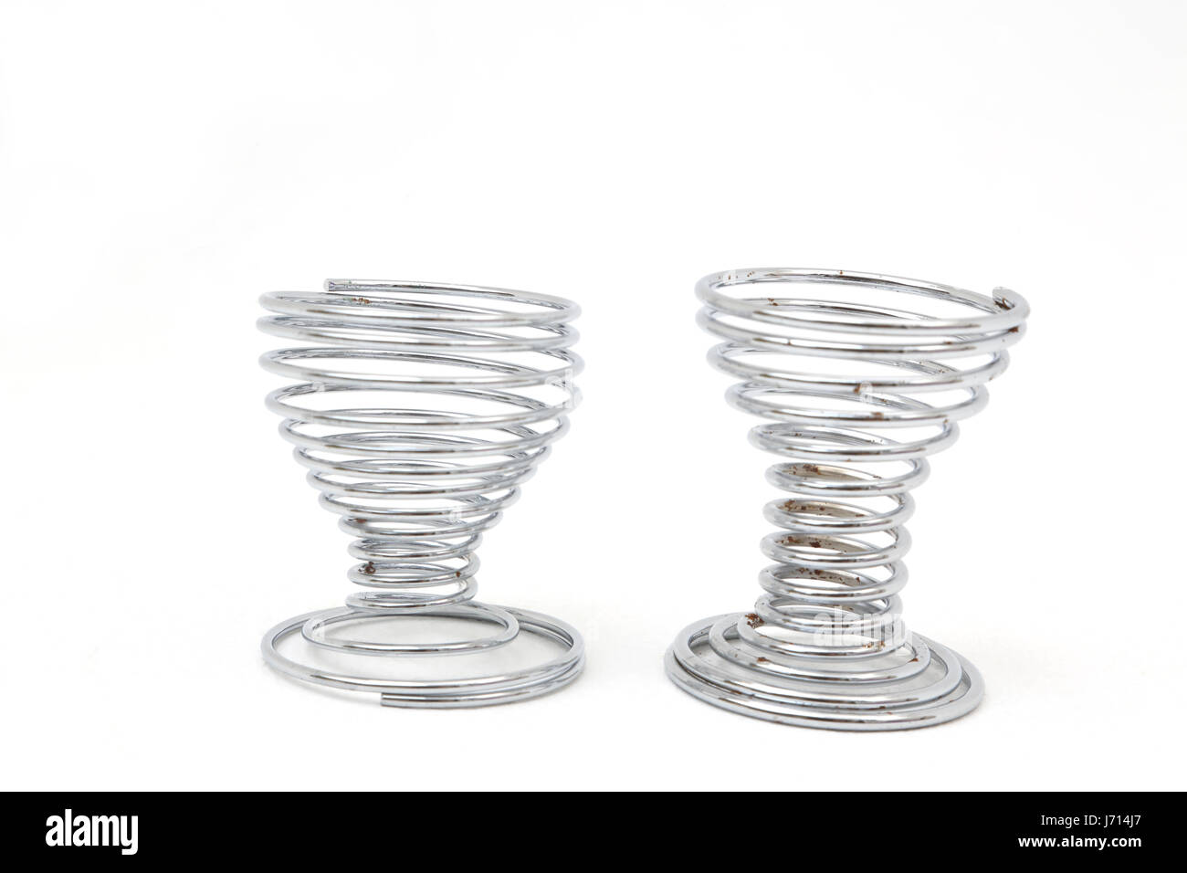 Two Coiled Metal Egg Cups Stock Photo
