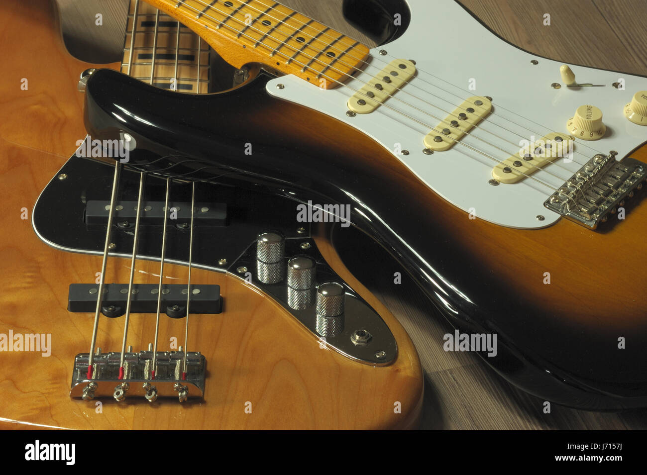 musical instruments stringed instruments bass basso music wood four electric Stock Photo