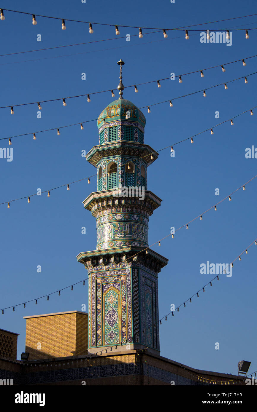 Minaret of The shrine of Fatima Al Masomeh in Qom, Iran Stock Photo