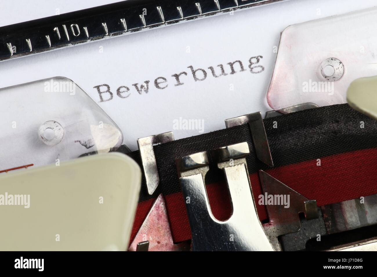 Bewerbung (German word for application) written with old typewriter
