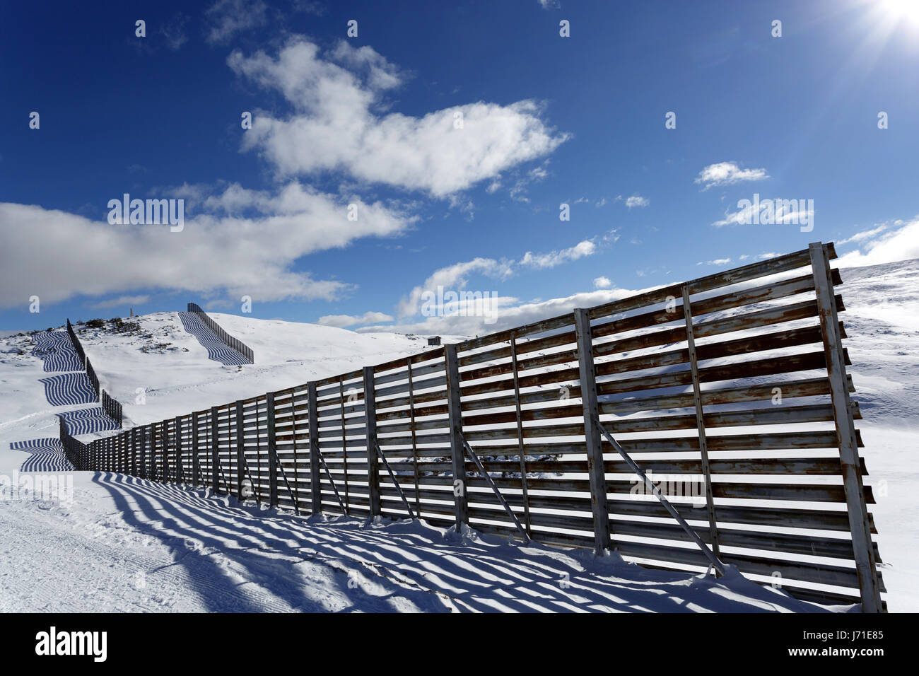 Wind fence on Dobratsch, Austria. Stock Photo