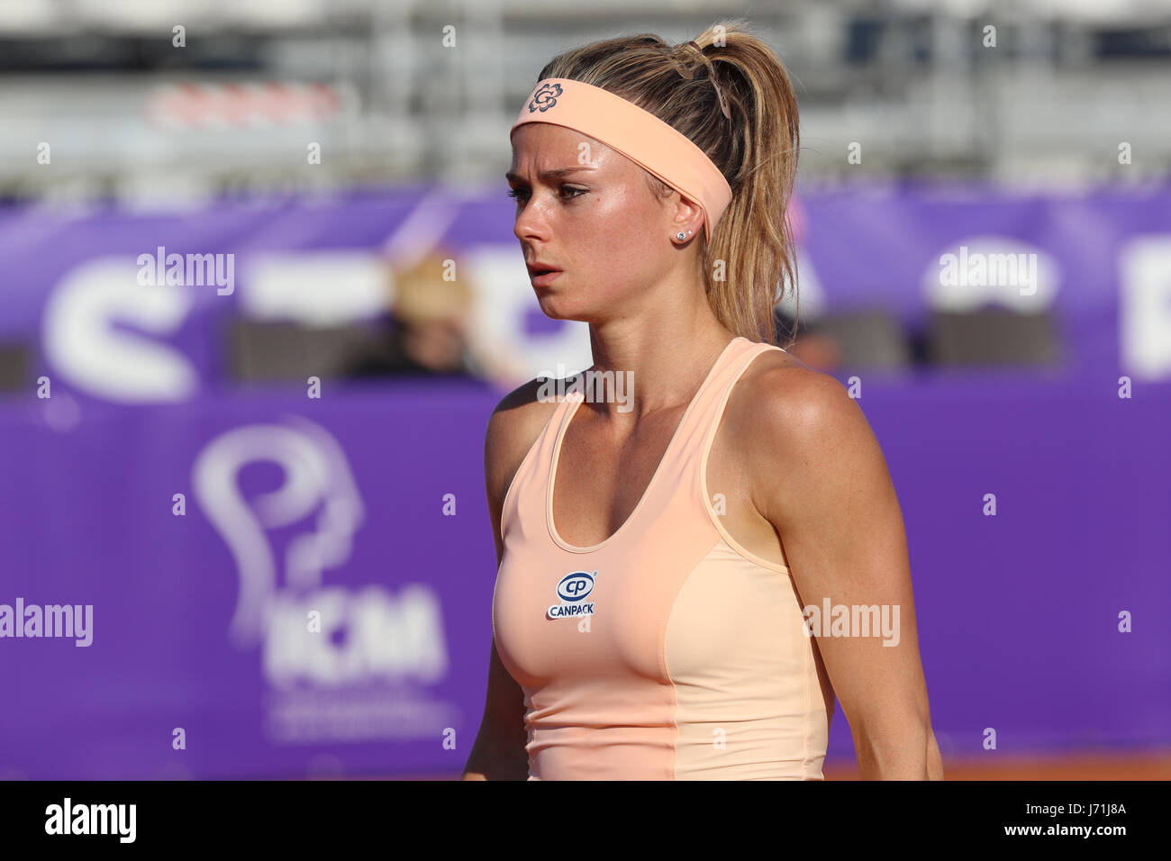 Strasbourg, France. 22nd May, 2017. Italian tennis player Camila Giorgi is in action during her match in the 1st round of the WTA Internationaux of Strasbourg vs Russia against Russian tennis player Elena Vesnina on May 22, 2017 in Strasbourg, France. Credit: Yan Lerval/Alamy Live News Stock Photo