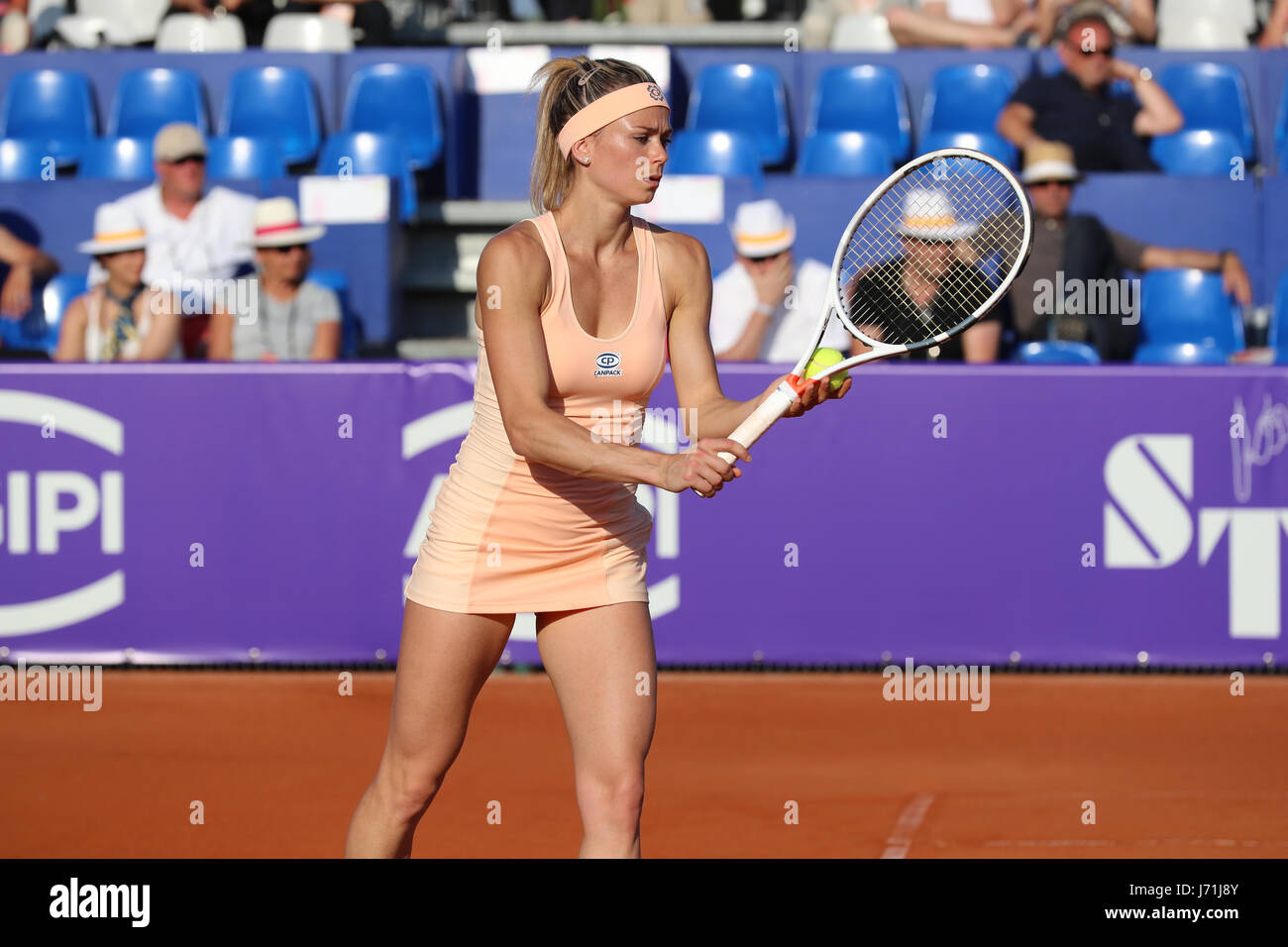 Strasbourg, France. 22nd May, 2017. Italian tennis player Camila Giorgi is in action during her match in the 1st round of the WTA Internationaux of Strasbourg vs Russia against Russian tennis player Elena Vesnina on May 22, 2017 in Strasbourg, France. Credit: Yan Lerval/Alamy Live News Stock Photo