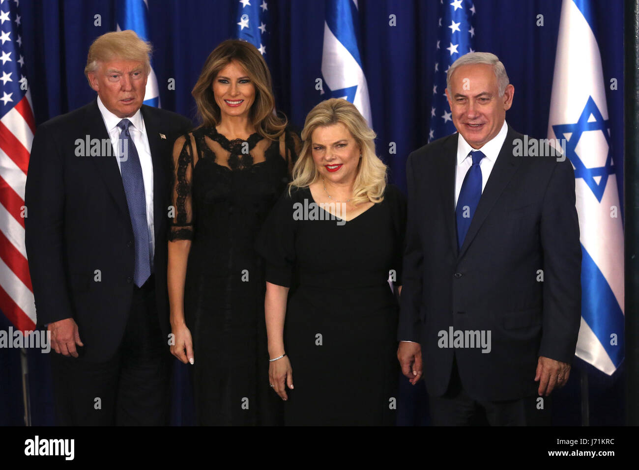 Jerusalem, R) and his wife Sara Netanyahu in Jerusalem. 22nd May, 2017. U.S. President Donald Trump (1st, L) and his wife Melania Trump (2nd L) pose for photos with Israeli Prime Minister Benjamin Netanyahu (1st, R) and his wife Sara Netanyahu in Jerusalem, on May 22, 2017. Speaking on the first day of his visit to Israel and the West Bank, U.S. President Donald Trump urged Israeli Prime Minister Benjamin Netanyahu to start a 'new partnership' with the Arab world. Credit: JINI/POOL/Marc Israel Sellem/Xinhua/Alamy Live News Stock Photo