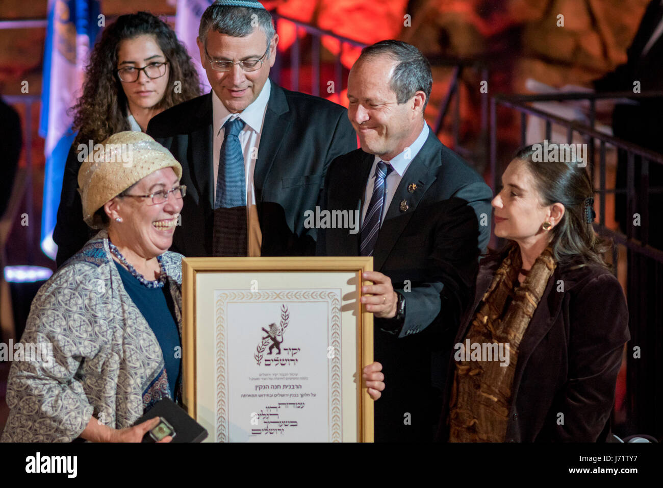Jerusalem, Israel. 22nd May, 2017. L-R: Rabbi Benni Lau, Jerusalem's Mayor Nir Barkat and Mrs. Ora Achimeir present Channa Henkin with a certificate of merit during the annual event at the Tower of David, honoring examplary citizens of Jerusalem. Credit: Yagil Henkin/Alamy Live News Stock Photo