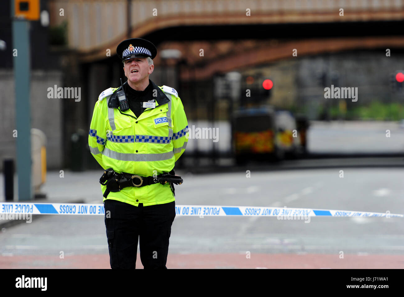 Manchester, UK. 23rd May, 2017. The scene outside the Manchester Arena, Manchester UK,  the morning after a suspected terrorist attack killed 22 people including children and injured 59 others at a concert by the pop star Ariana Grande. Picture by Paul Heyes, Monday May 22, 2017. Credit: Paul Heyes/Alamy Live News Credit: Paul Heyes/Alamy Live News Stock Photo