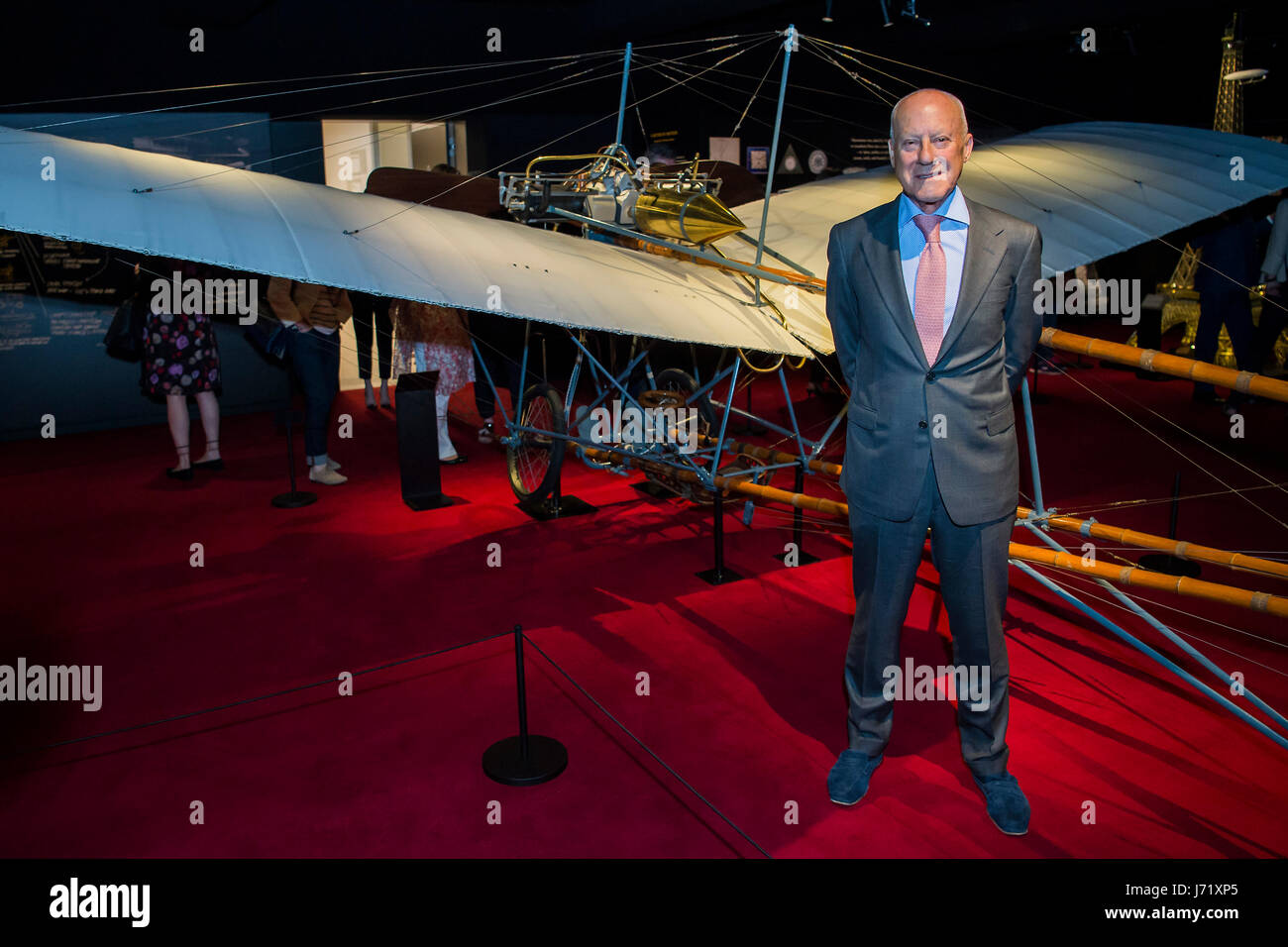 London, UK. 23rd May, 2017. Lord Norman Foster, one of the curators with a replica of the Santos-Dumont 20 aeroplane- The Cartier in Motion exhibition at the design museum. London 23 May 2017. Credit: Guy Bell/Alamy Live News Stock Photo