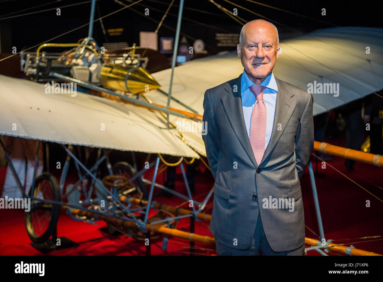 London, UK. 23rd May, 2017. Lord Norman Foster, one of the curators with a replica of the Santos-Dumont 20 aeroplane- The Cartier in Motion exhibition at the design museum. London 23 May 2017. Credit: Guy Bell/Alamy Live News Stock Photo