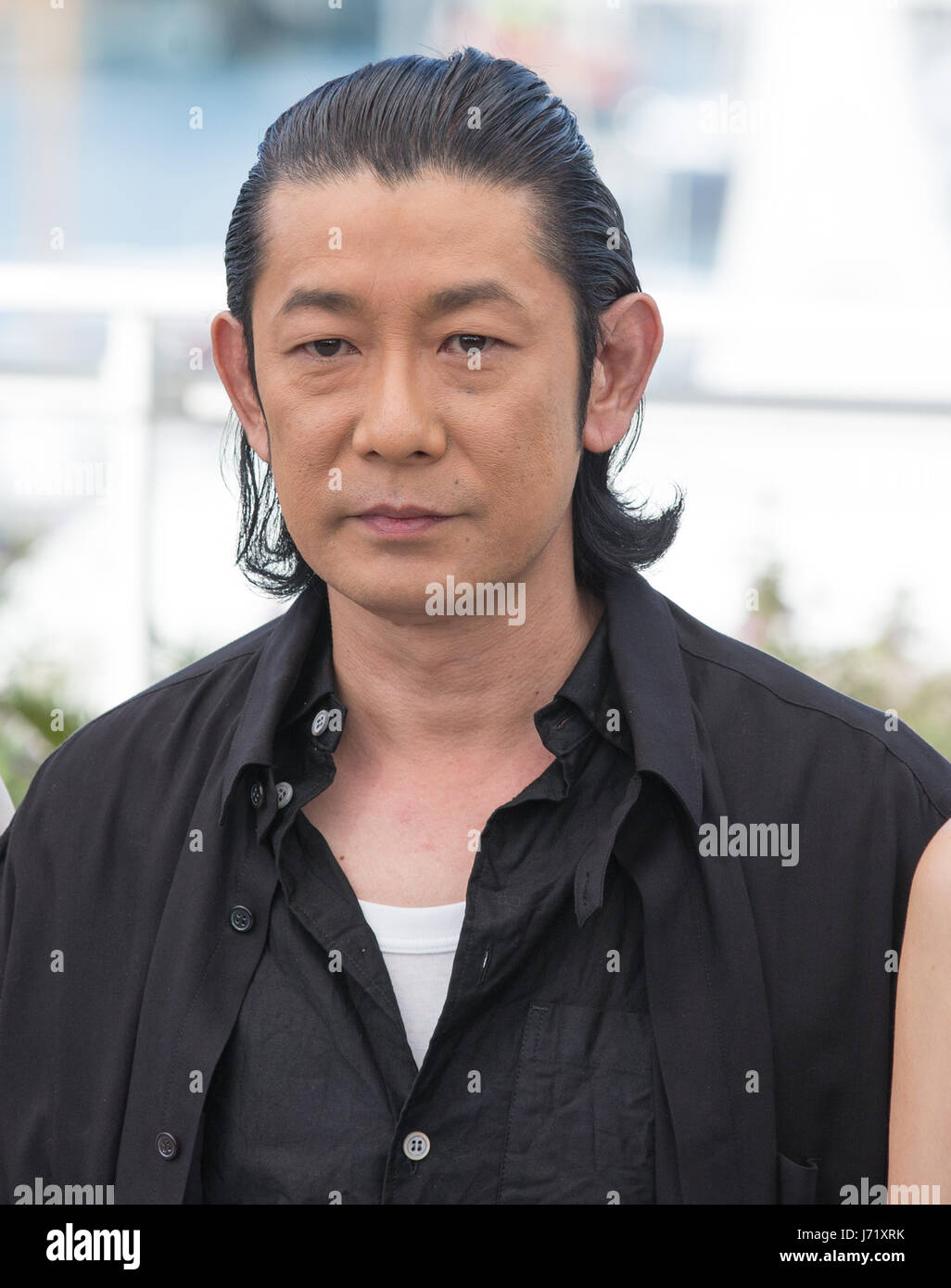 Cannes, France. 23rd May, 2017. Actor Masatoshi Nagase poses for a photocall of the film 'Hikari (Radiance) ' during the 70th Cannes Film Festival at Palais des Festivals in Cannes, France, on May 23, 2017. Credit: Xu Jinquan/Xinhua/Alamy Live News Stock Photo