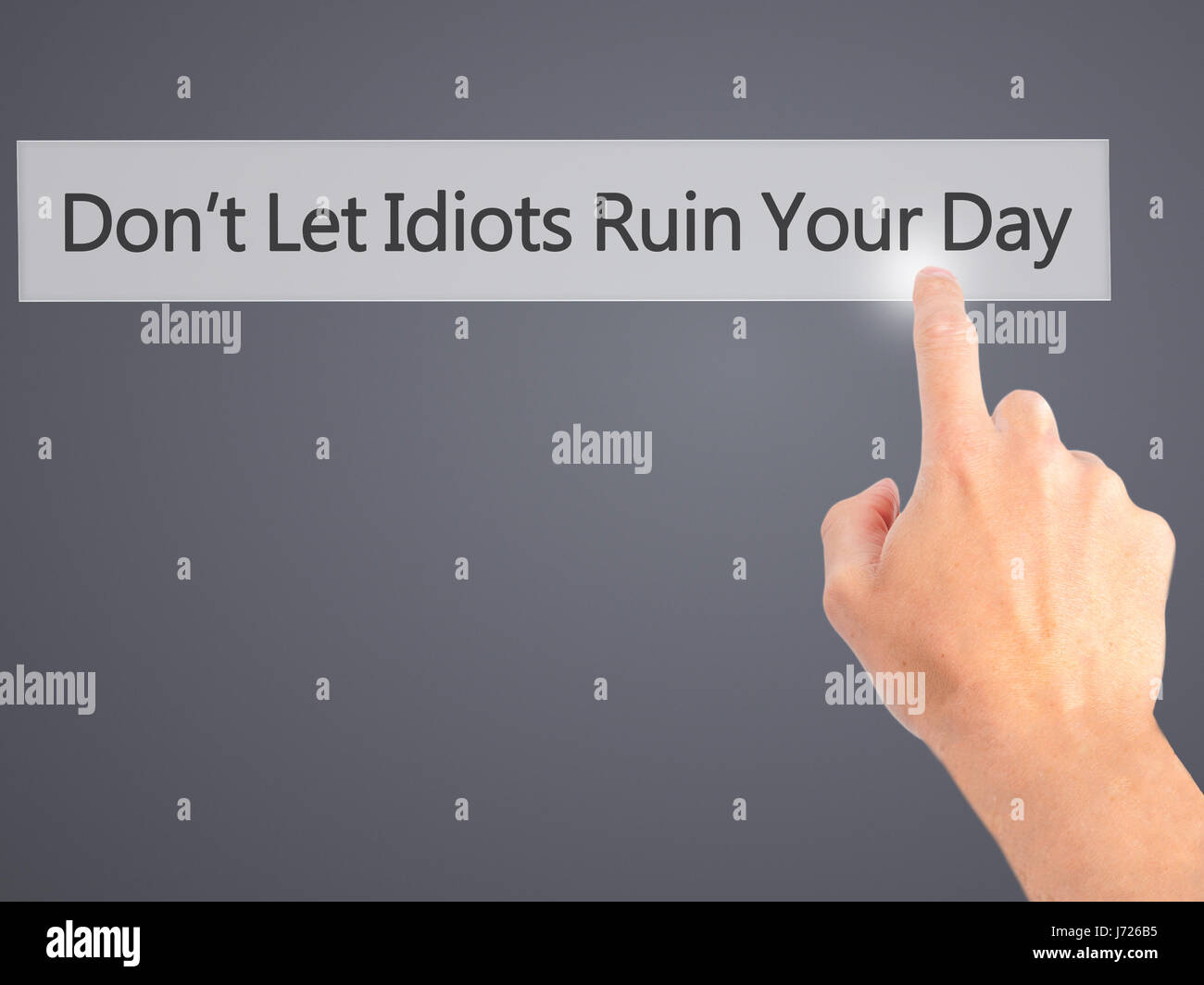Don't Let Idiots Ruin Your Day - Hand pressing a button on blurred ...