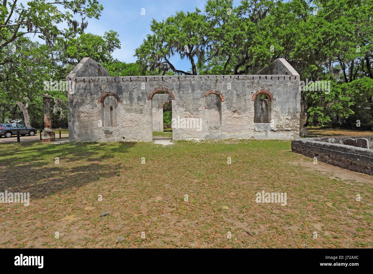 Tabby wall ruins and graveyard of the Chapel of Ease from Saint Helenas Episcopal Church on Saint Helena Island in Beaufort County, South Carolina Stock Photo