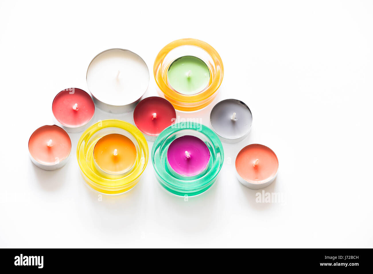 colorful candles isolated on white background Stock Photo - Alamy