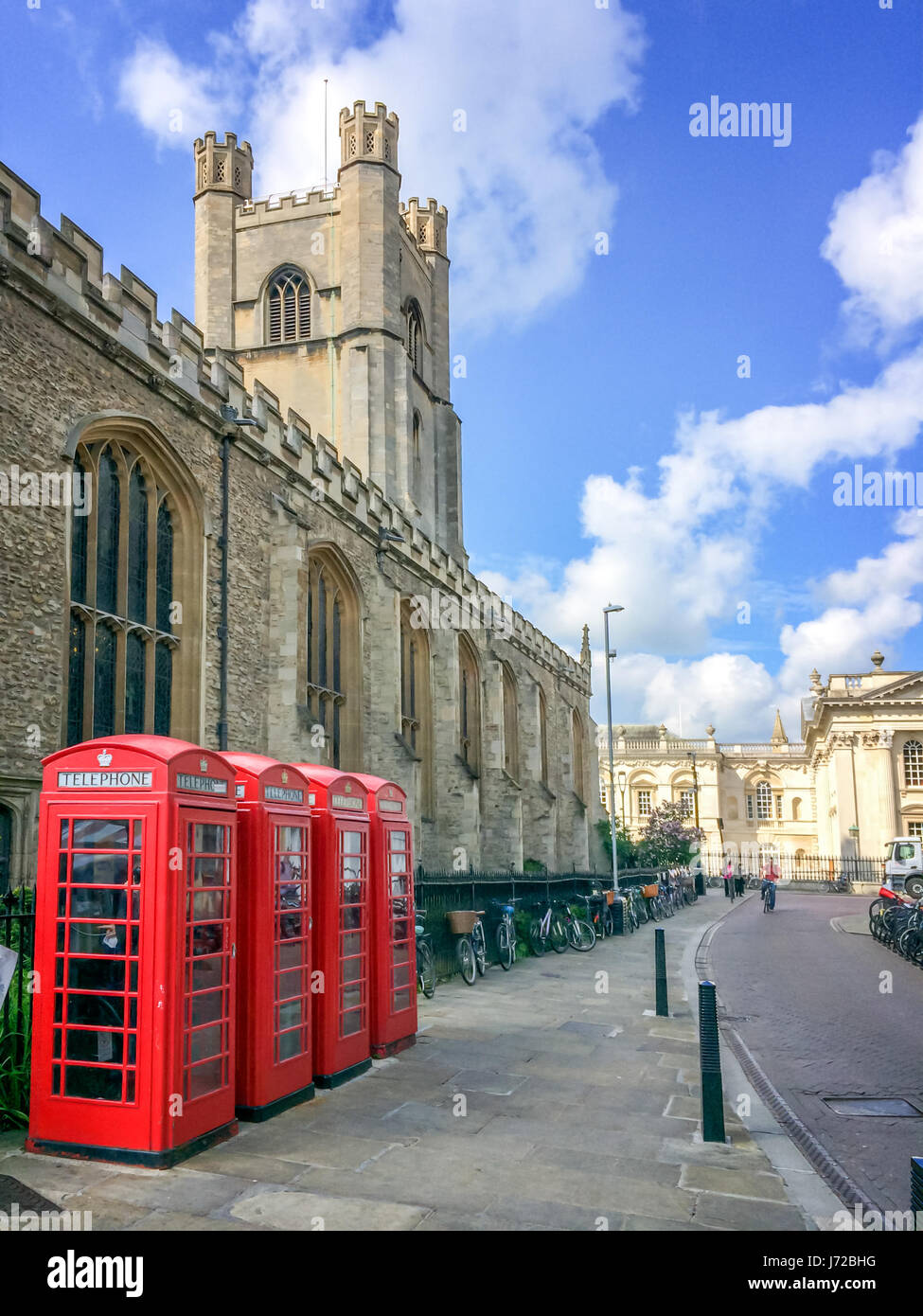 Old style British telephone booths by Great Saint Mary church in the University city of Cambridge, UK Stock Photo