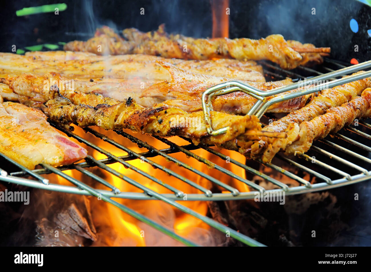rust grill barbecue barbeque steak pig meat boil cooks boiling cooking outside Stock Photo