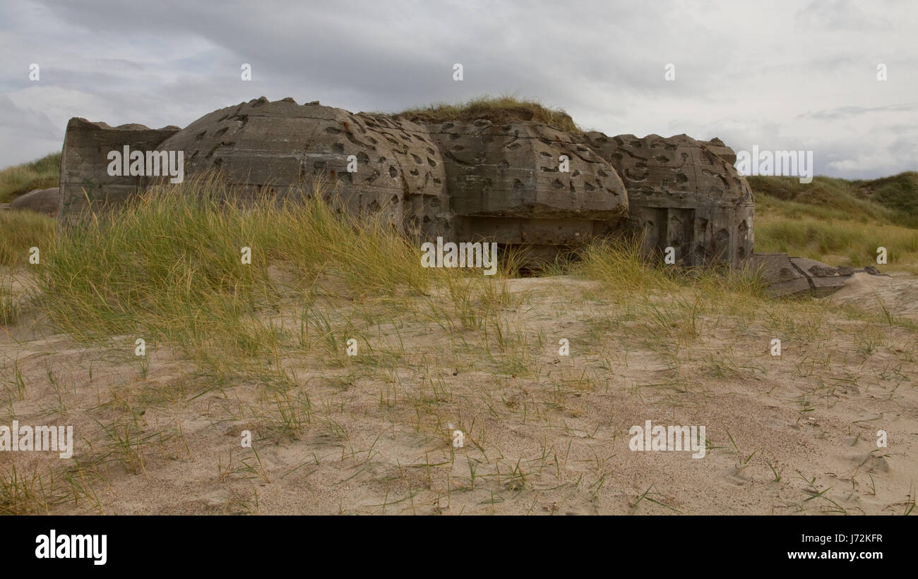 bunker denmark ruin fortress chateau castle hill green beach seaside the beach Stock Photo