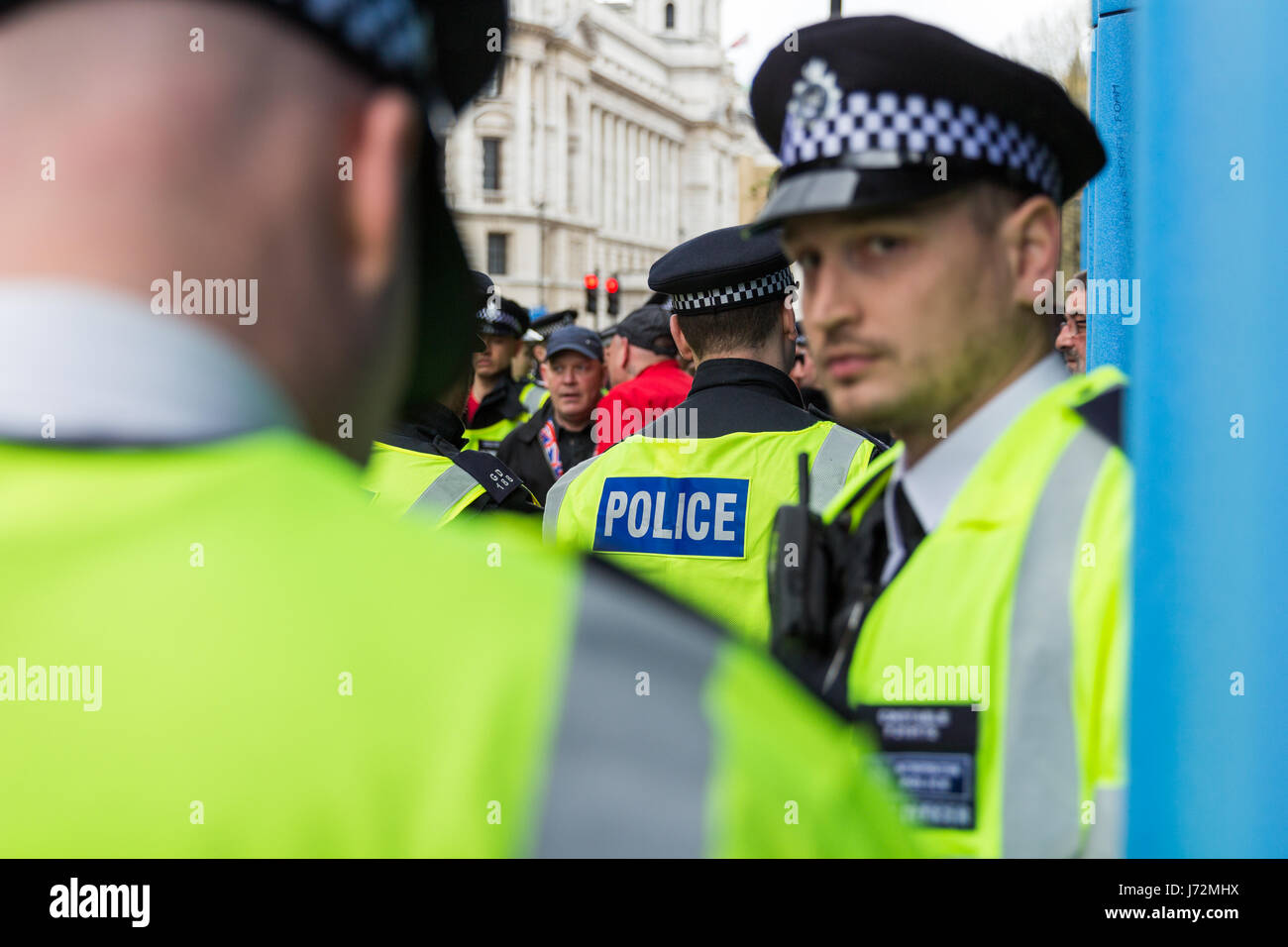 London, UK - 1st April, 2017. Police trying to keep in order protest against Islamists, ISIS. Stock Photo