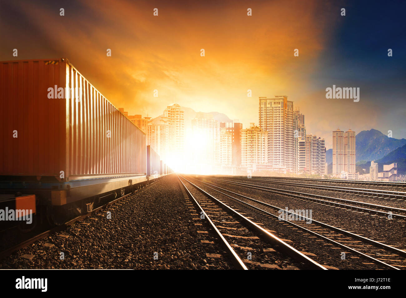 industry container trainst running on railways track against beautiful ...