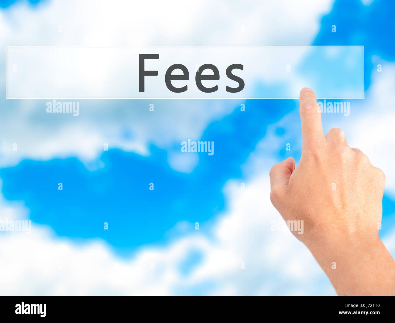 Fees - Hand pressing a button on blurred background concept . Business ...