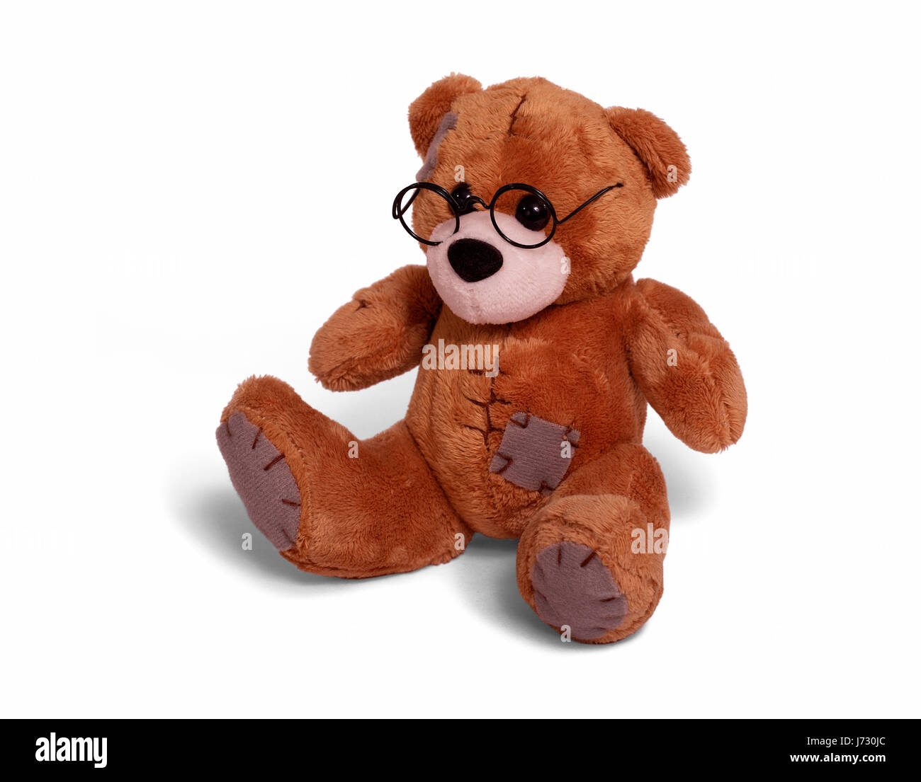 teddy bear wearing glasses