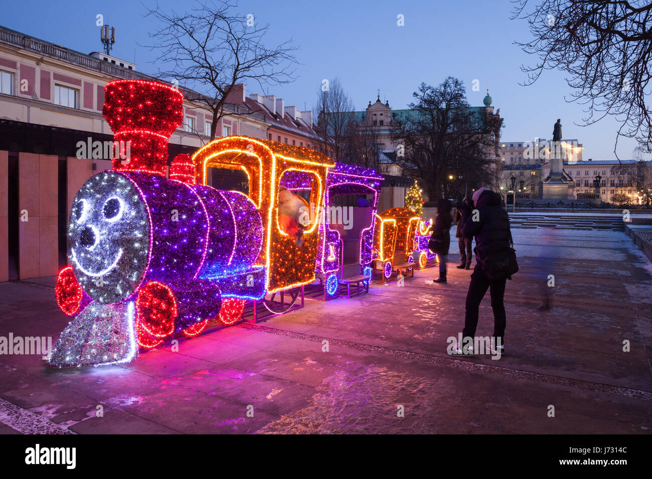 Locomotive and train christmas illumination at night on The Hoover Square in city of Warsaw, Poland, Europe Stock Photo