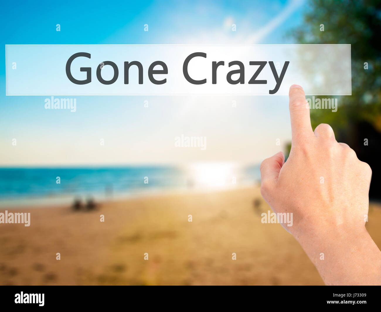 Gone Crazy - Hand pressing a button on blurred background concept ...
