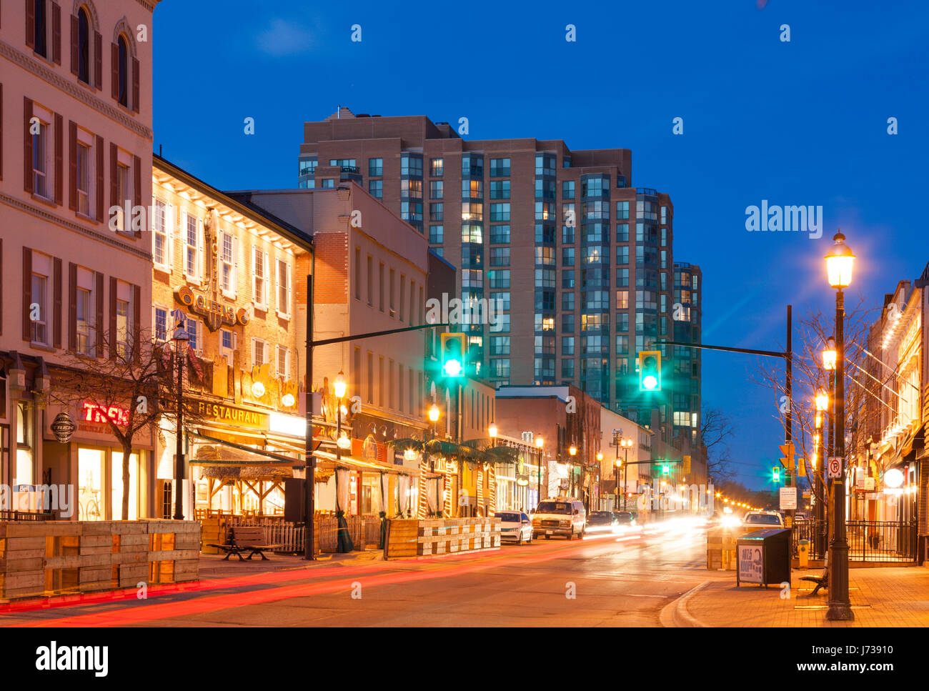 Downtown Barrie in the spring along Dunlop Street East at dusk. Barrie Ontario, Canada. Stock Photo