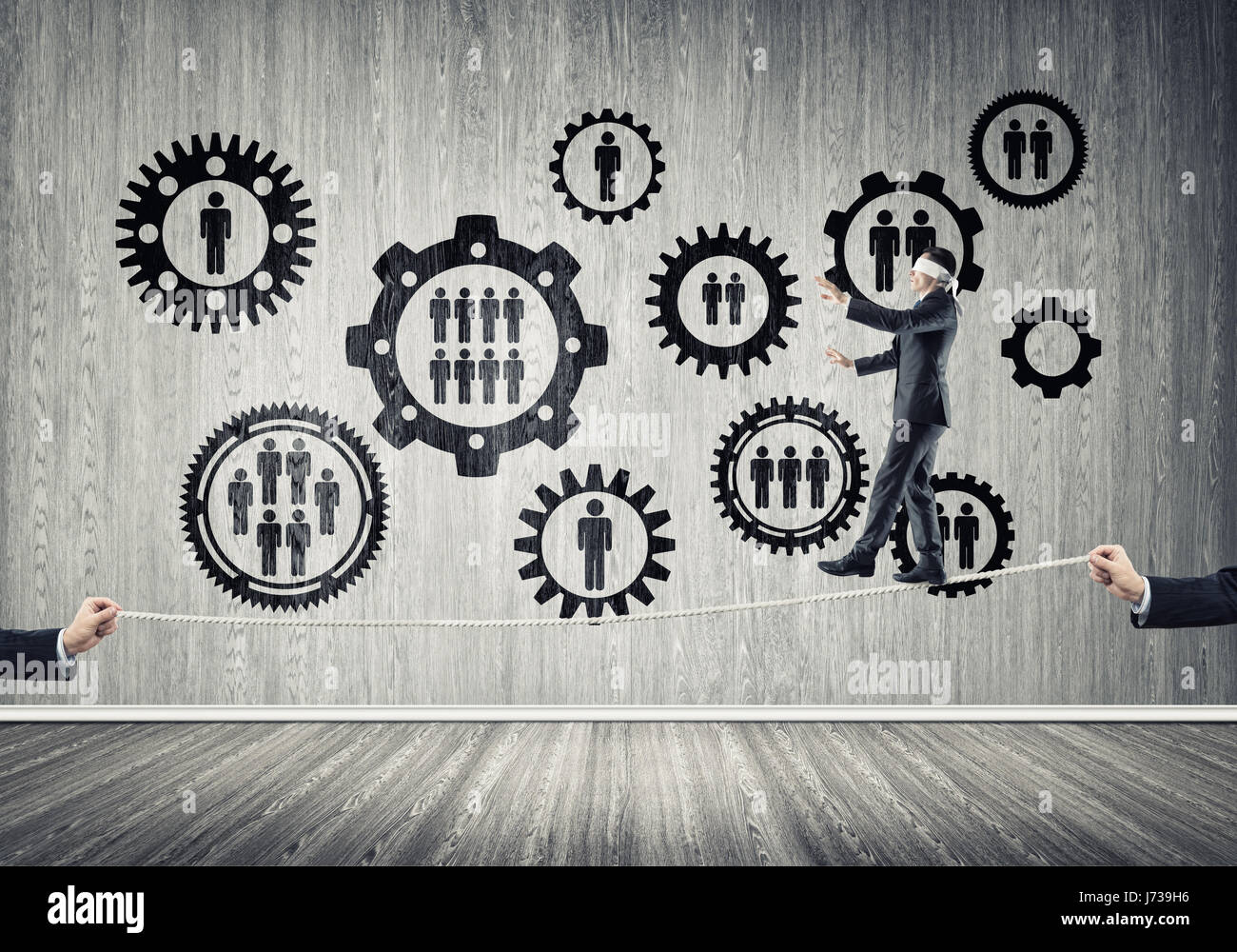 Business concept of risk support and assistance with man balancing on ...