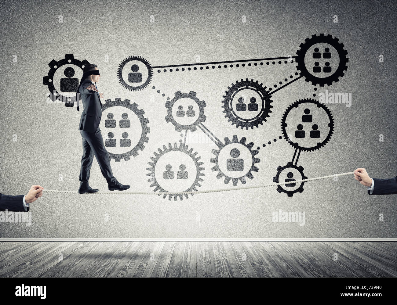 Business concept of risk support and assistance with man balancing on ...