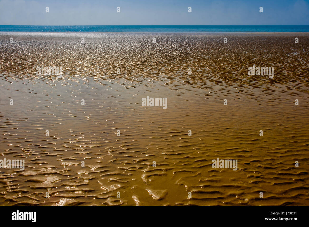 Rippled sand on Camber Sands beach, East Sussex, England, UK Stock Photo