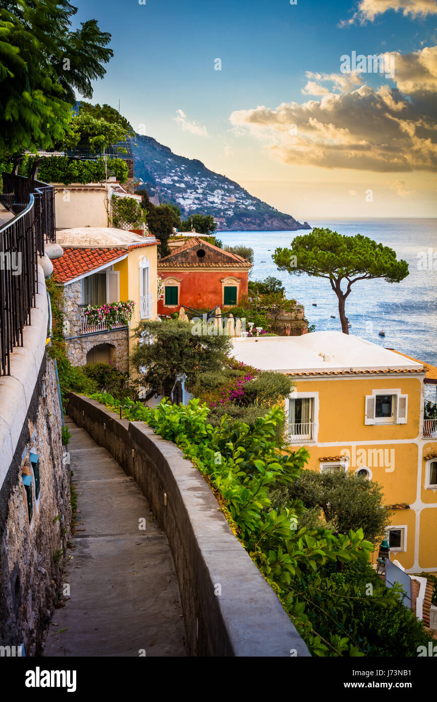 Positano is a village and comune on the Amalfi Coast (Costiera Amalfitana), in Campania, Italy, mainly in an enclave in the hills leading down to the  Stock Photo