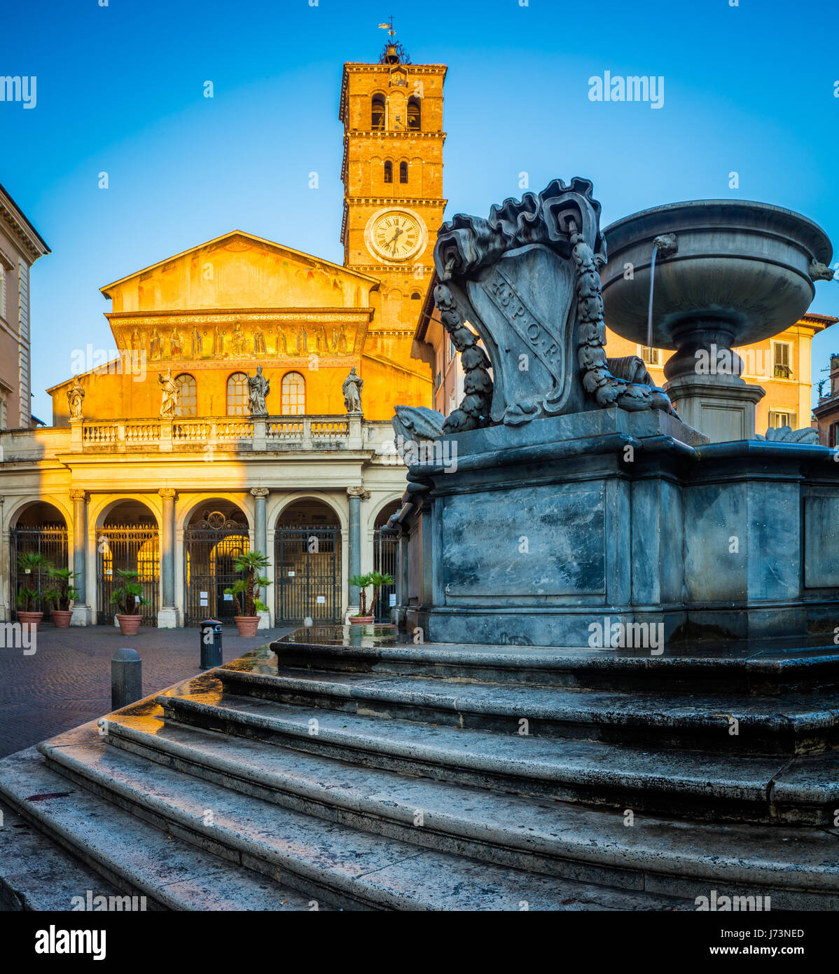 Piazza di Santa Maria and Basilica di Santa Maria in the Trastevere part of Rome, Italy Stock Photo